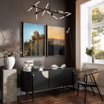 Modern living room with Mount Teide Reverie - Set of 2 wall art, black sideboard, chair, and sunny large window.