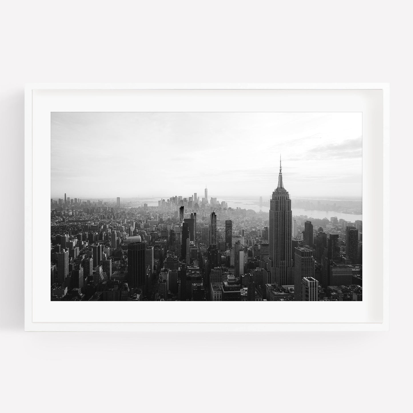 NYC Skyline Black and White features the Empire State Building in a striking monochrome cityscape photograph.