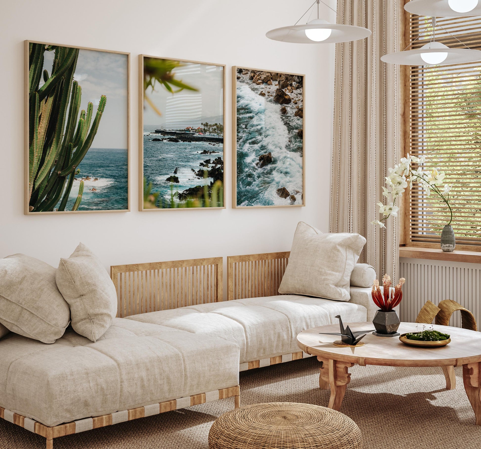A cozy living room with beige sofas, a wooden table, and the Puerto de la Cruz - Set of 3 on the wall.