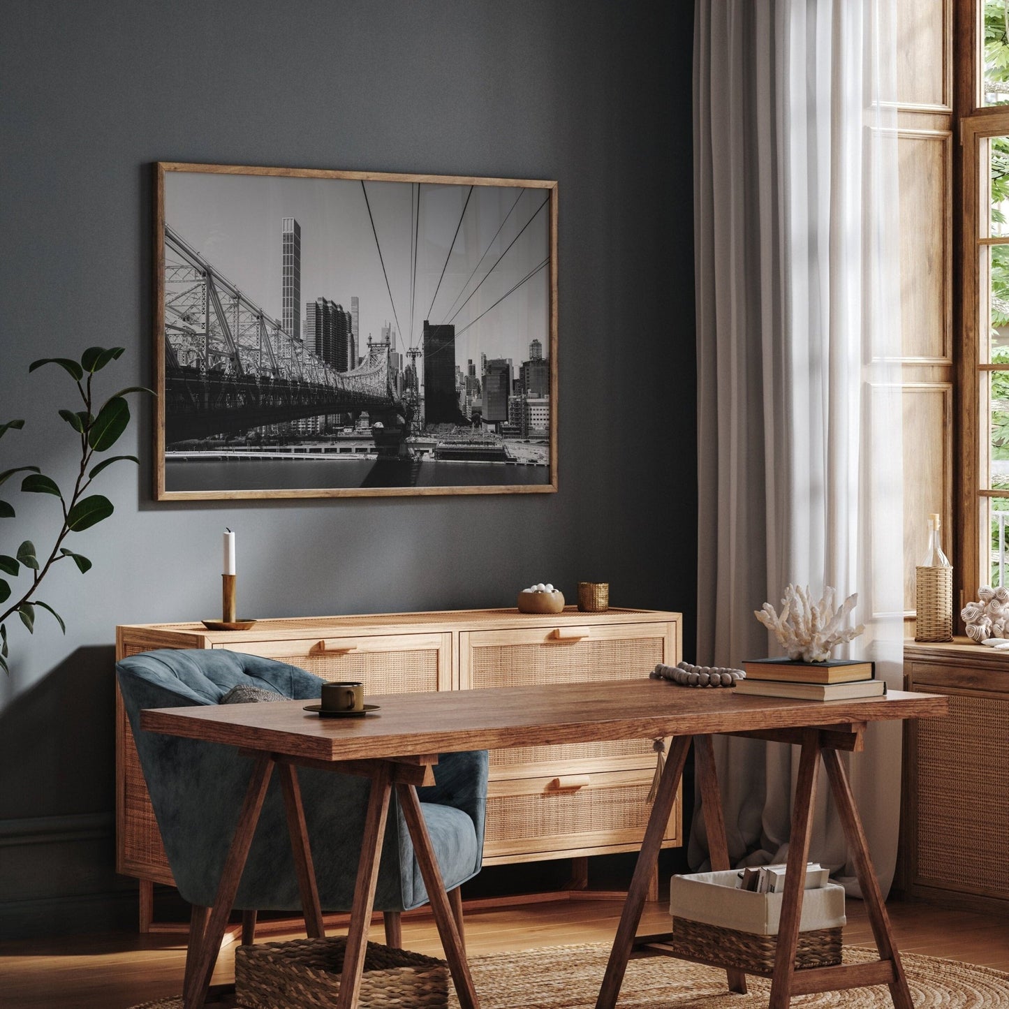 Stylish home office with a wooden desk, chair, and cabinet, featuring Queensboro Bridge Black and White photo on the wall.