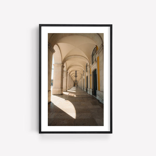 Rhythmic Arches framed photo features sunlit columns and vaulted ceilings, displayed on a white wall.
