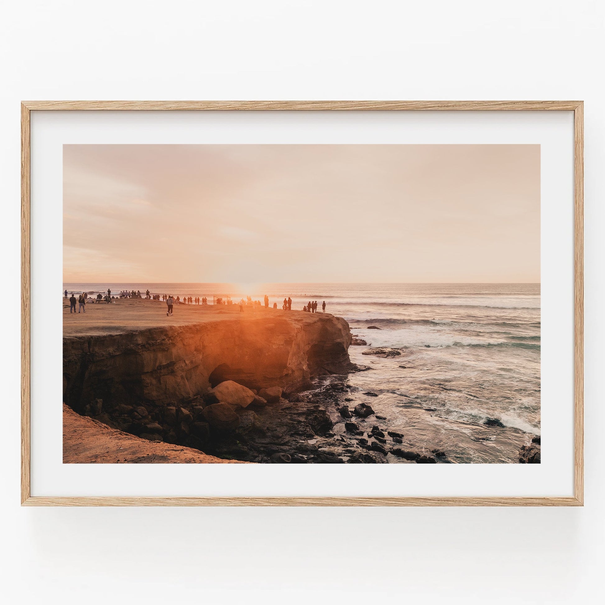 Framed Sunset Cliffs photo featuring a coastal sunset scene with people on a cliff overlooking the ocean.