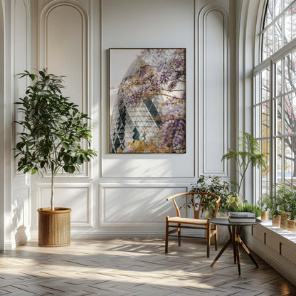 Elegant room with a large window, chair, plants, and The Gherkin nature photograph on a white paneled wall.