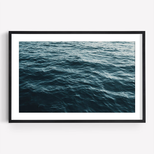 Water Ripples I captures serene deep blue ocean waves, showcasing an endless expanse of water under natural light.